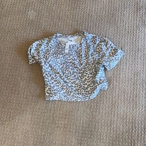 Top shop cheetah cropped sleeping top!! Never worn